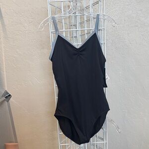 Sodanca -  Black leotard with gray trim and cross cross back.